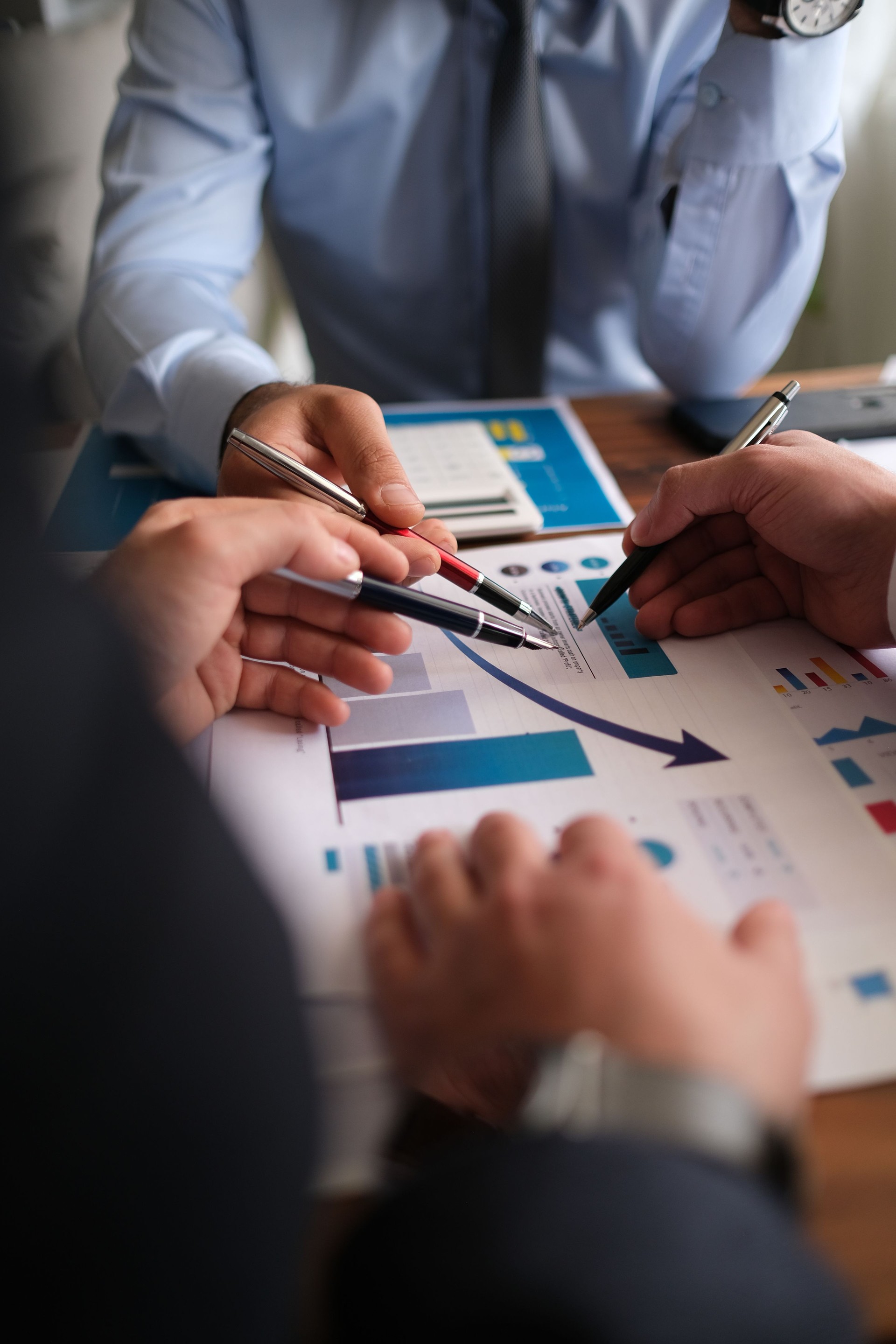 Business accounting concept, Business man using calculator with computer laptop, budget and loan paper in office.